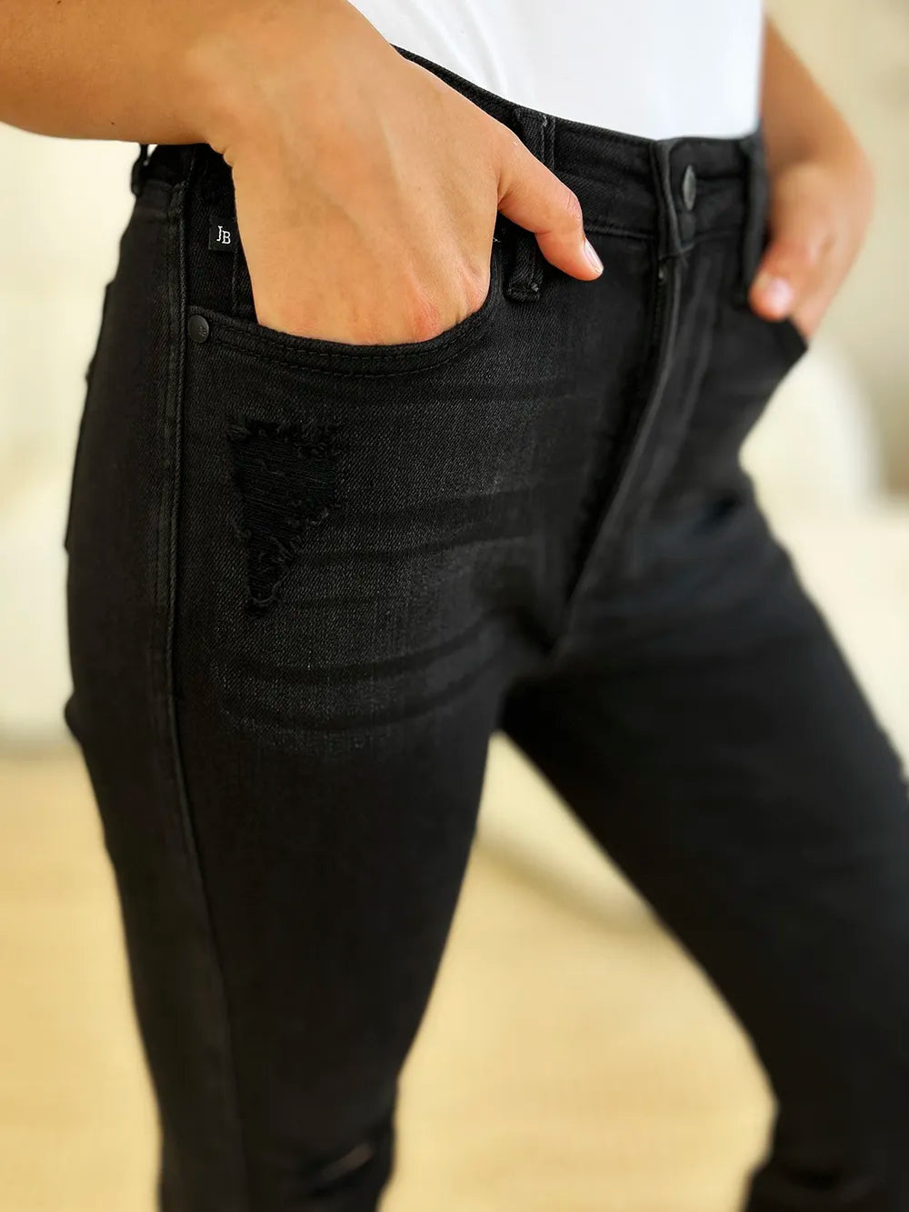Black Judy Blue full size high waist distressed flare jeans with ripped details and a fitted silhouette.