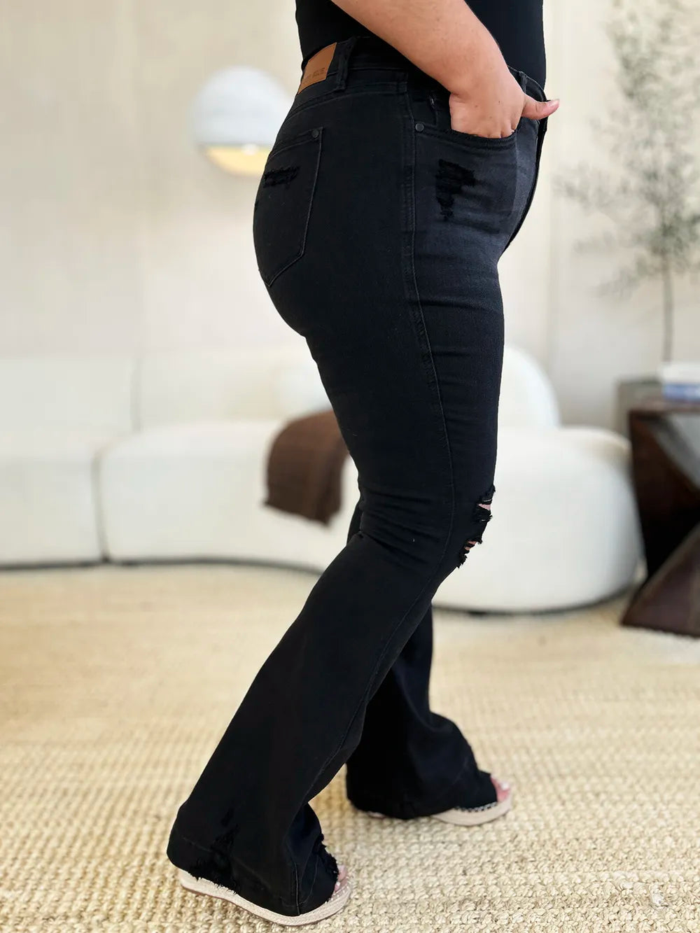 Black Judy Blue high waist distressed flare jeans, full size, with ripped details and a flattering fit.