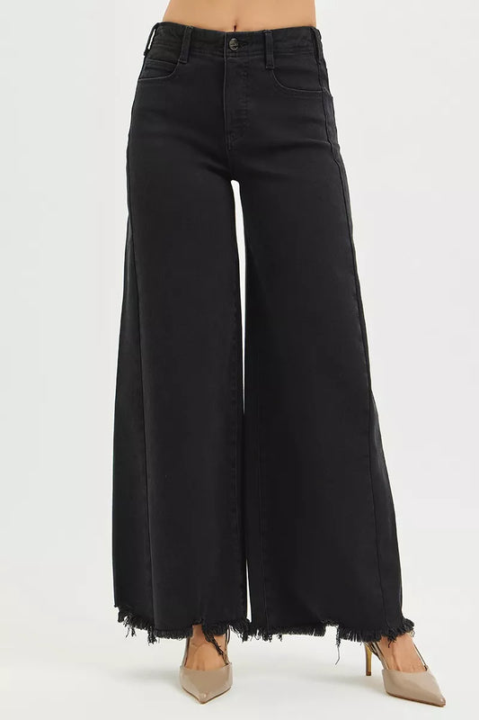 Black RISEN high-rise palazzo jeans with tummy control and frayed hem, designed by Trendsi, shown on a model.