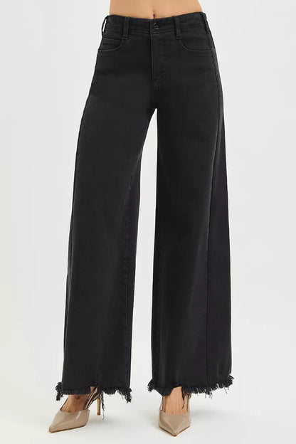 Black RISEN high-rise palazzo jeans with tummy control, frayed hem, and wide leg fit, styled for a trendy casual look.