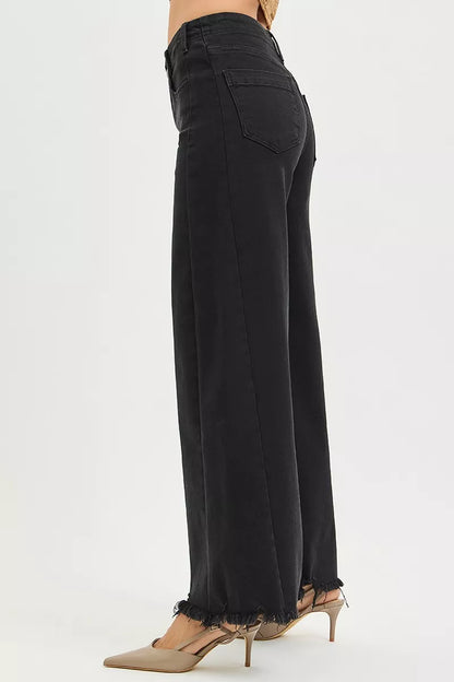 Black RISEN high-rise palazzo jeans with tummy control and frayed hem, featuring a relaxed fit and stylish design.