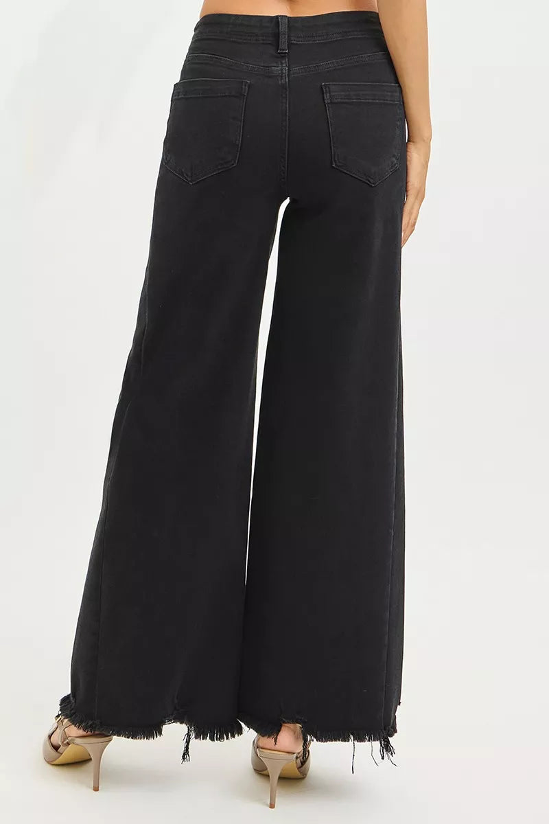 Black RISEN Tummy Control High Rise Palazzo Leg Jeans with frayed hem, designed for a comfortable, stylish fit.
