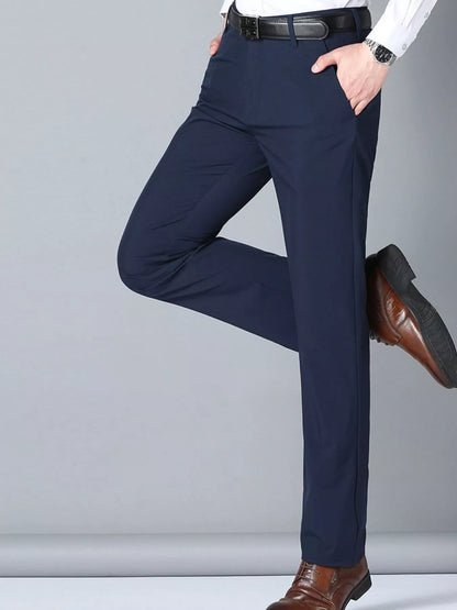 Black men's slim fit casual pants by Trendsi, shown in size 29 with a tailored, modern fit and classic style.
