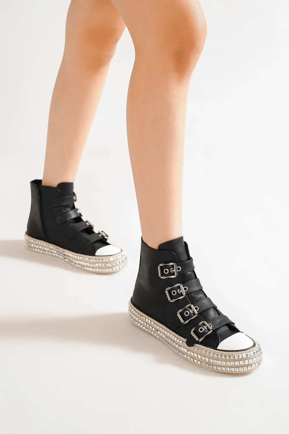 Black Beast Fashion platform sneakers with multi-buckle straps and studded details, featuring a trendy, chunky sole.