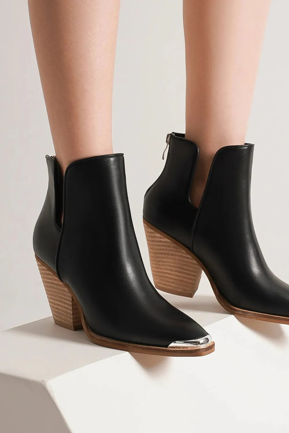 Black Trendsi Beast Fashion pointed metal-tip toe block heel ankle boots, showcasing sleek design and sturdy heel.