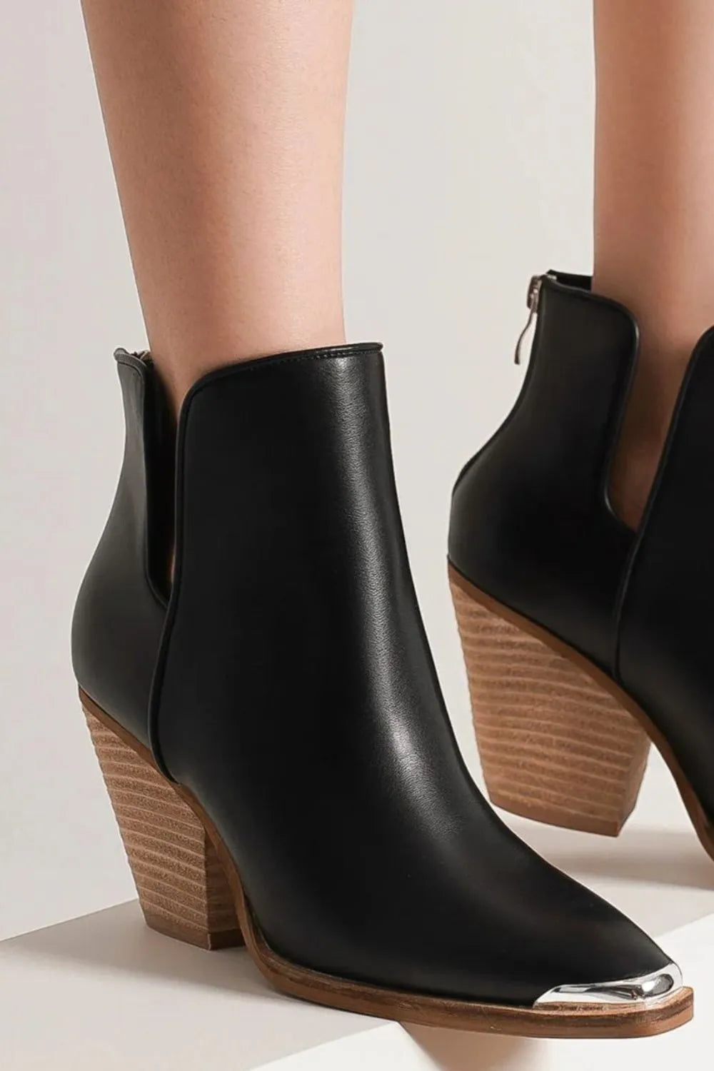 Black Trendsi Beast Fashion pointed metal-tip toe block heel ankle boots, stylish and modern footwear with a sleek design.