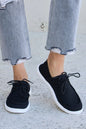 Black Forever Link flat round toe lace-up sneakers by Trendsi, featuring a sleek design and comfortable fit.