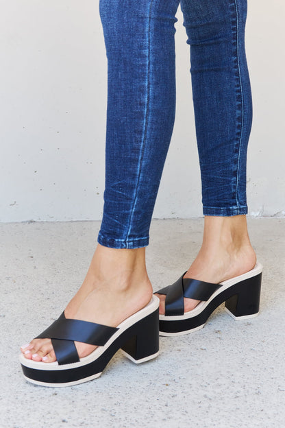 Black Weeboo Cherish The Moments contrast platform sandals by Trendsi, featuring thick soles and stylish design.