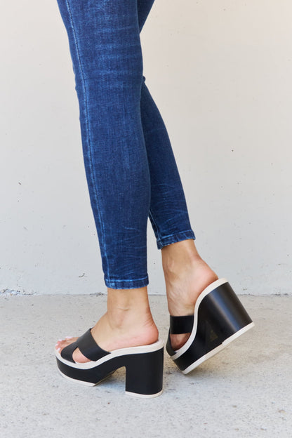 Black Weeboo Cherish The Moments contrast platform sandals with thick soles and stylish straps, perfect for casual wear.