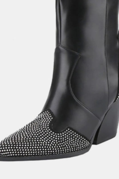 Black Weeboo Western boots with chunky heels and rhinestone decoration, featuring pointed toe and western-inspired design.