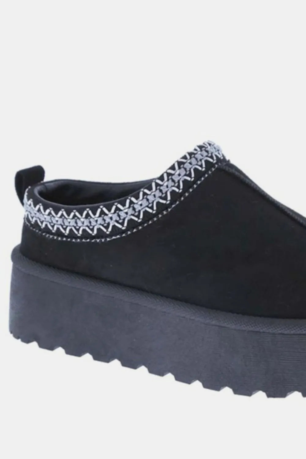Black Weeboo platform slip-on boots with embroidered trim and chunky sole, stylish and comfortable footwear from Trendsi.