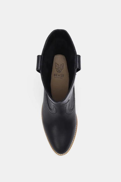 Black butterfly cut detail point toe boots by Beast Fashion featuring trendy design and sleek style.