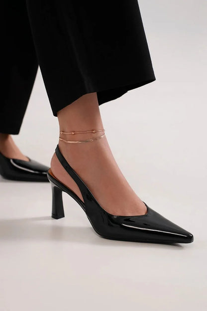 Black Beast Fashion faux leather point toe slingback pumps by Trendsi, showing the elegant design and sleek heel.