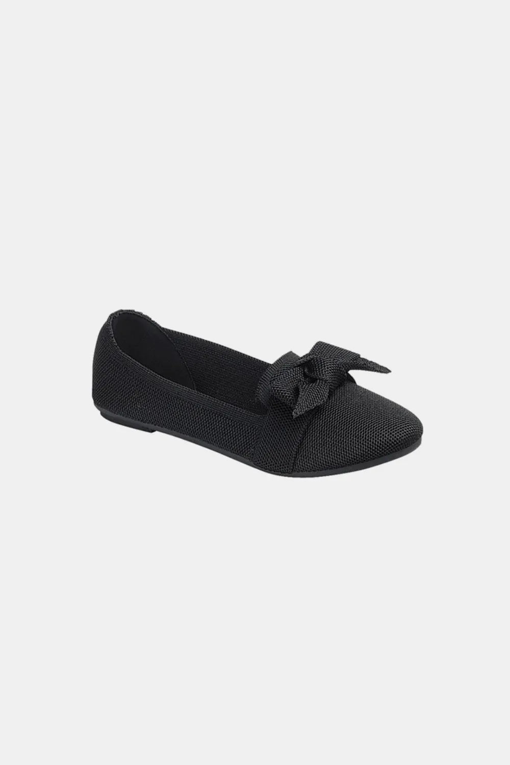Black Forever Link bow tie slip-on ballet flats by Trendsi, featuring a stylish bow detail and comfortable slip-on design.