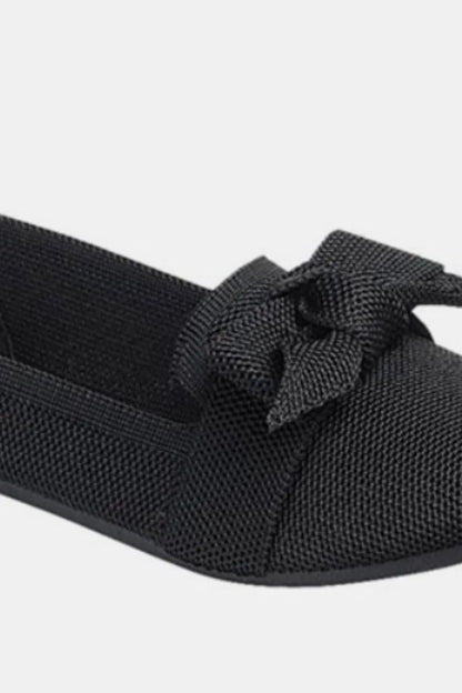Black Trendsi Forever Link bow tie slip-on ballet flats with a sleek design and comfortable fit.