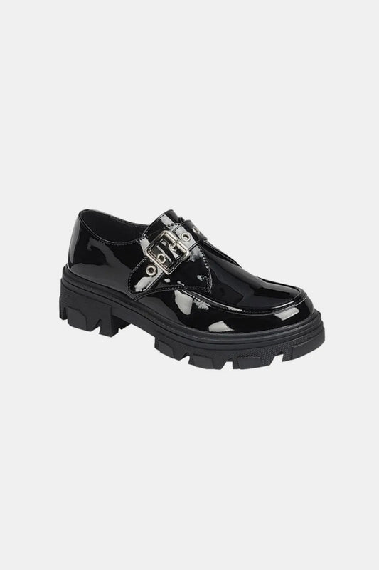 Black Forever Link Buckled Platform Lug Sole Loafers by Trendsi, showing the stylish loafers with buckle details and chunky lug soles.