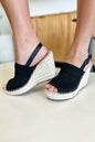 Black Forever Link peep toe high heel sandals by Trendsi, featuring a sleek design with ankle straps and stiletto heels.