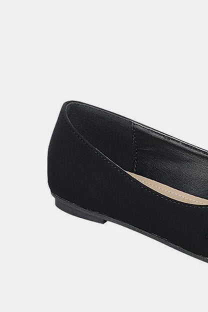 Black Trendsi Forever Link slip-on ballet flats with rhinestone buckle detail and comfortable flat sole.