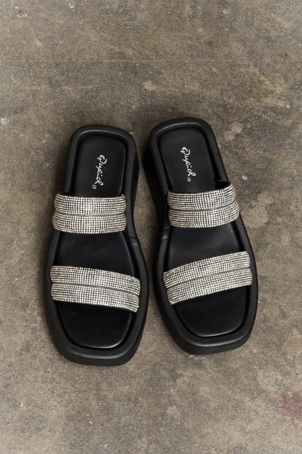 Black Qupid Bright Mind platform wedge sandals with rhinestone embellishments, featuring open toes and ankle straps.
