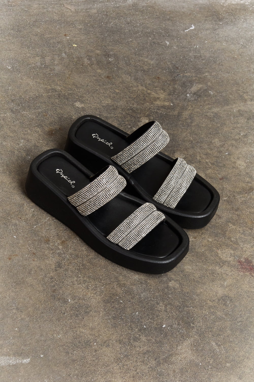 Black Qupid Bright Mind platform wedge sandal with rhinestone embellishments, stylish open-toe design, and ankle strap.