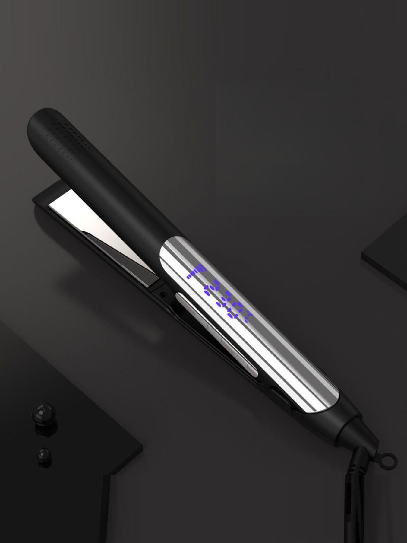 Black adjustable temperature hair straightener by Trendsi with European plug and ceramic plates for sleek styling.