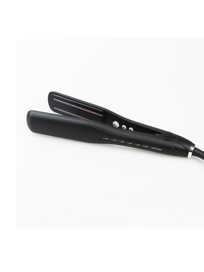 Black adjustable temperature hair straightener by Trendsi with European plug, sleek design for smooth styling.