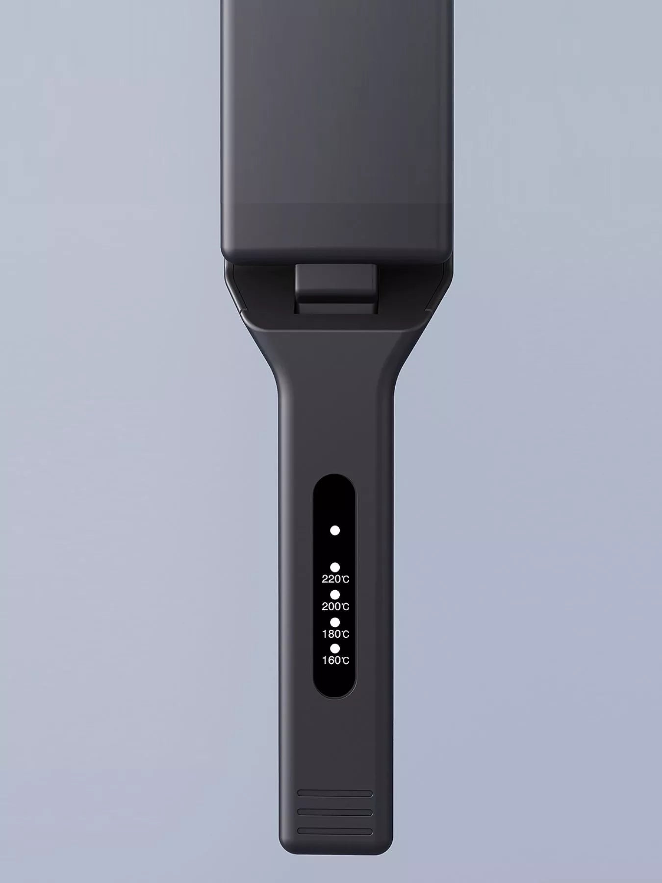 Black adjustable temperature hair straightener by Trendsi with European plug, featuring sleek design and ceramic plates.