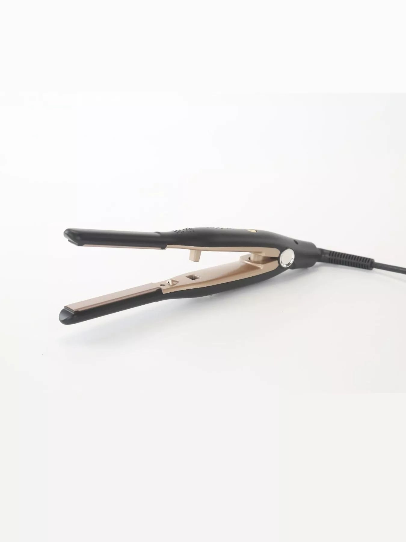 Black Trendsi adjustable temperature hair straightener with European plug, featuring ceramic plates for smooth styling.