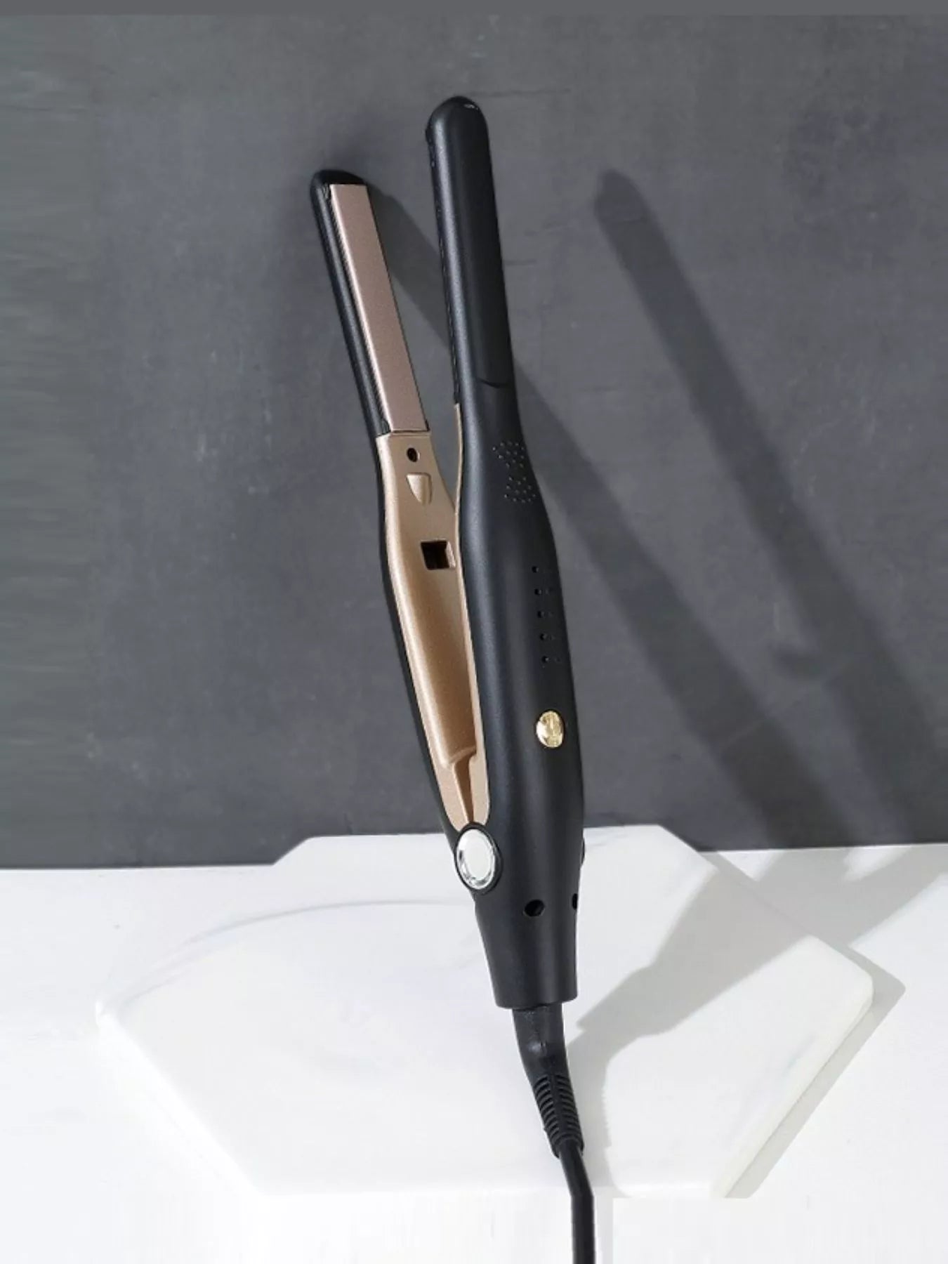Black Trendsi adjustable temperature hair straightener with European plug, featuring ceramic plates and ergonomic design for styling.