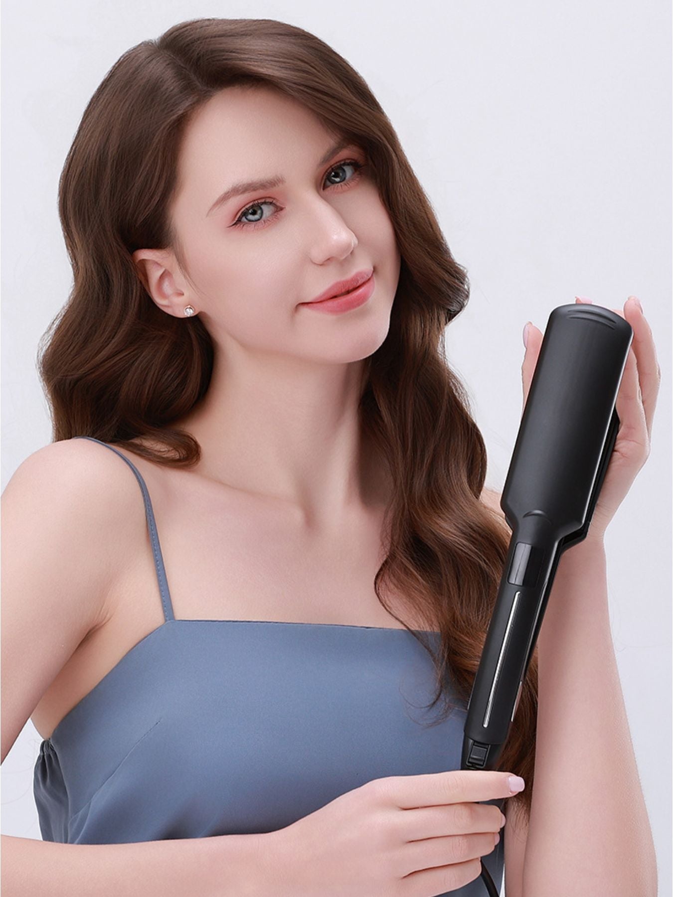 Black Trendsi fast heating hair straightener with European plug, sleek design, and ceramic plates for smooth, shiny hair.