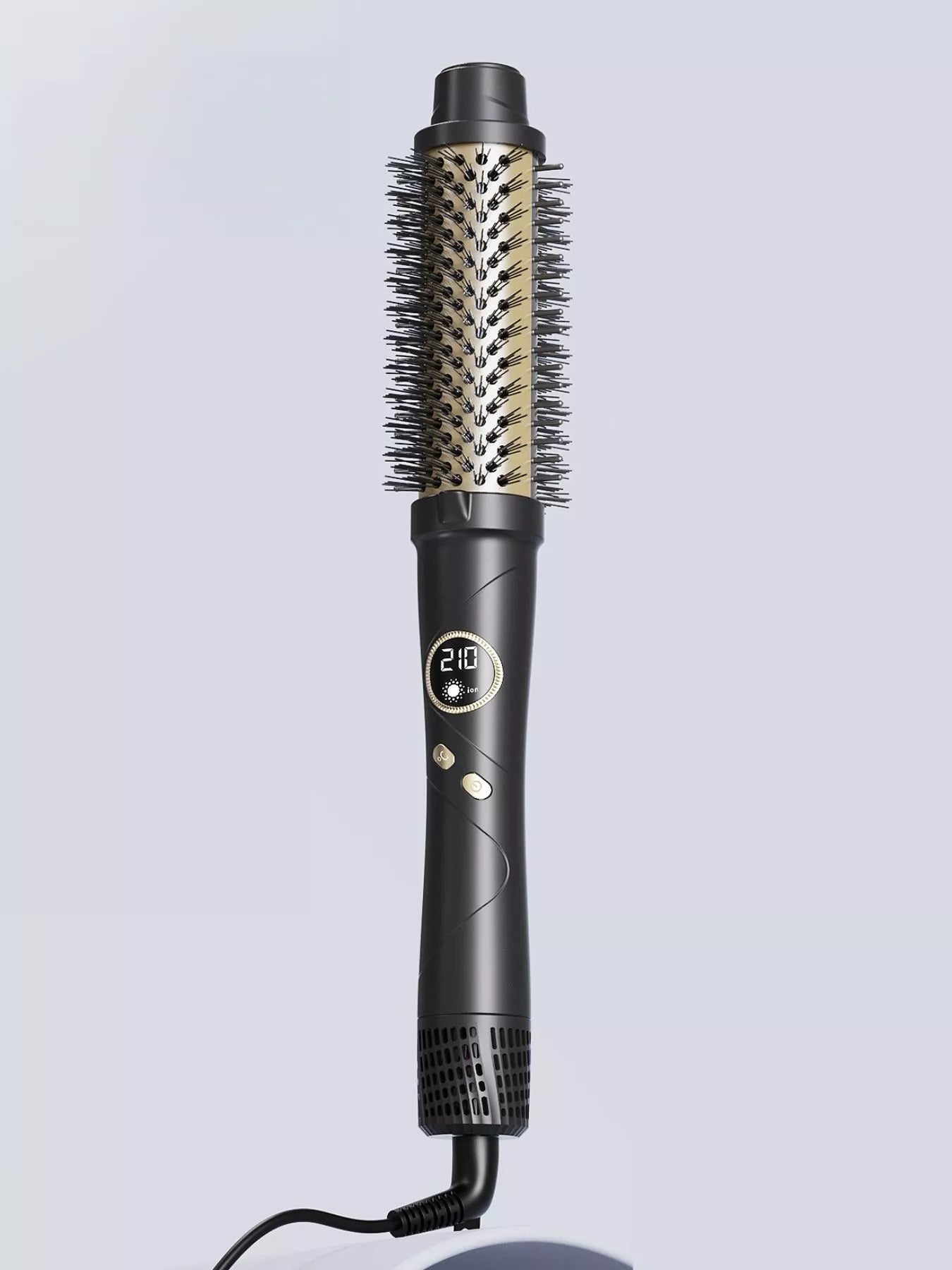 Black Trendsi fast heating hot air brush with European plug for quick styling and smooth, voluminous hair.