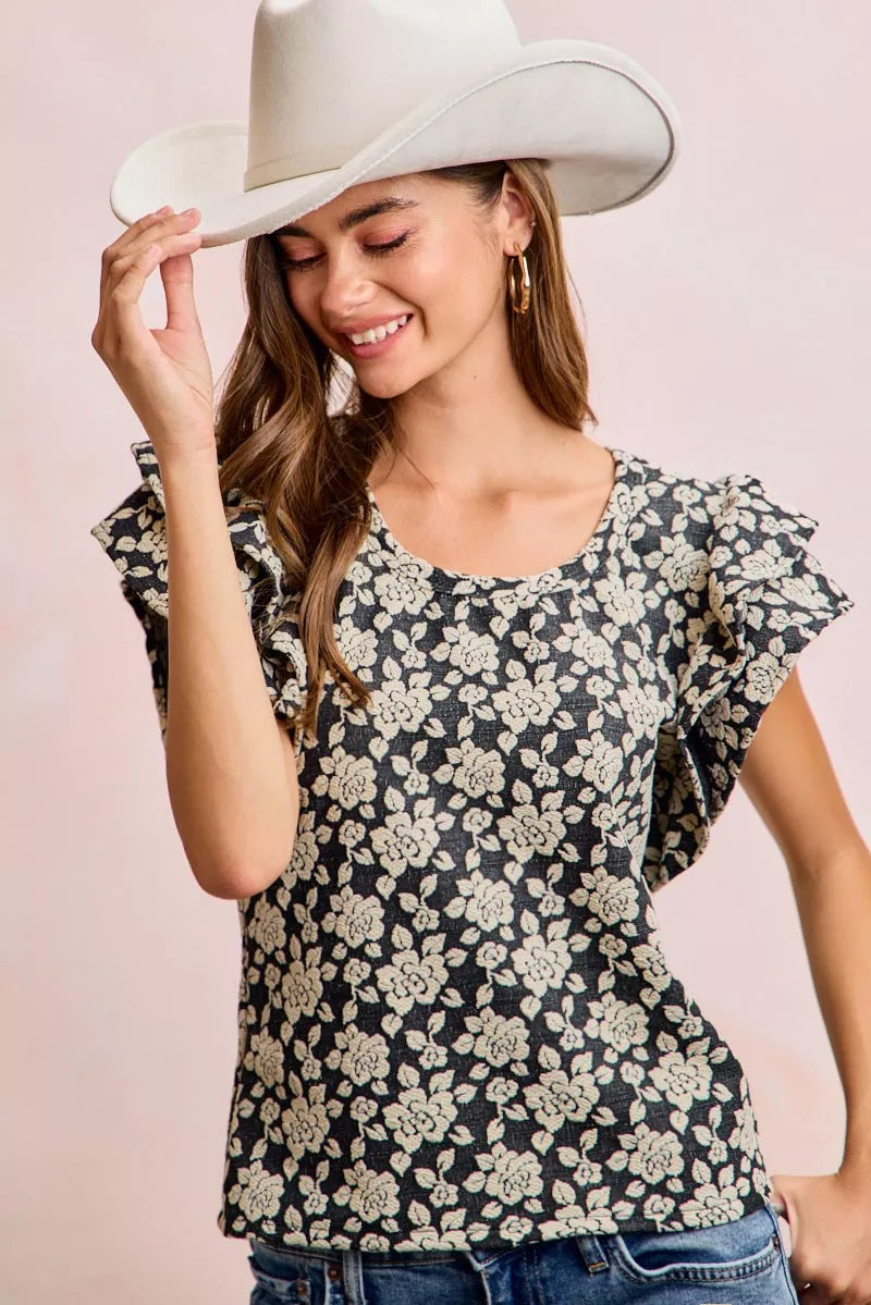 Black and light grey BiBi floral jacquard knit top with ruffle sleeves from Trendsi, featuring a stylish, textured design.