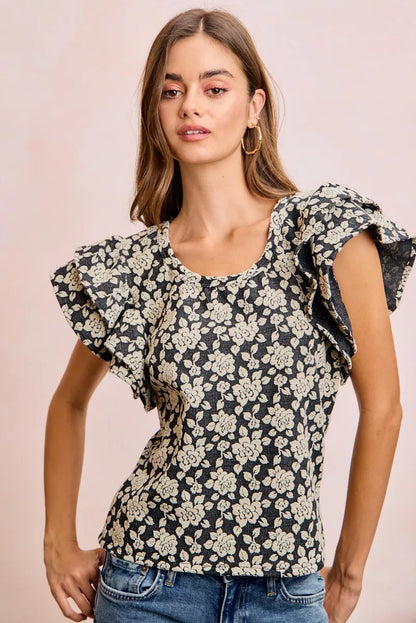 Black BiBi floral jacquard knit top with ruffle sleeves, stylish and cozy, from Trendsi.