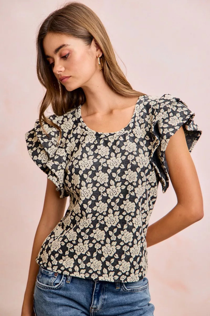 Black BiBi floral jacquard knit top with ruffle sleeves, stylish and cozy Trendsi women's fashion top.