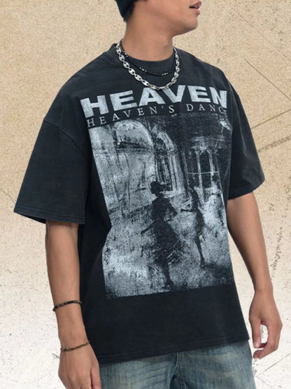 Black men's graphic round neck short sleeve T-shirt by Trendsi, showcasing a stylish print on the front.