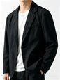 Plus size men's black button-up long sleeve blazer by Trendsi, tailored fit with lapel collar and front pockets.