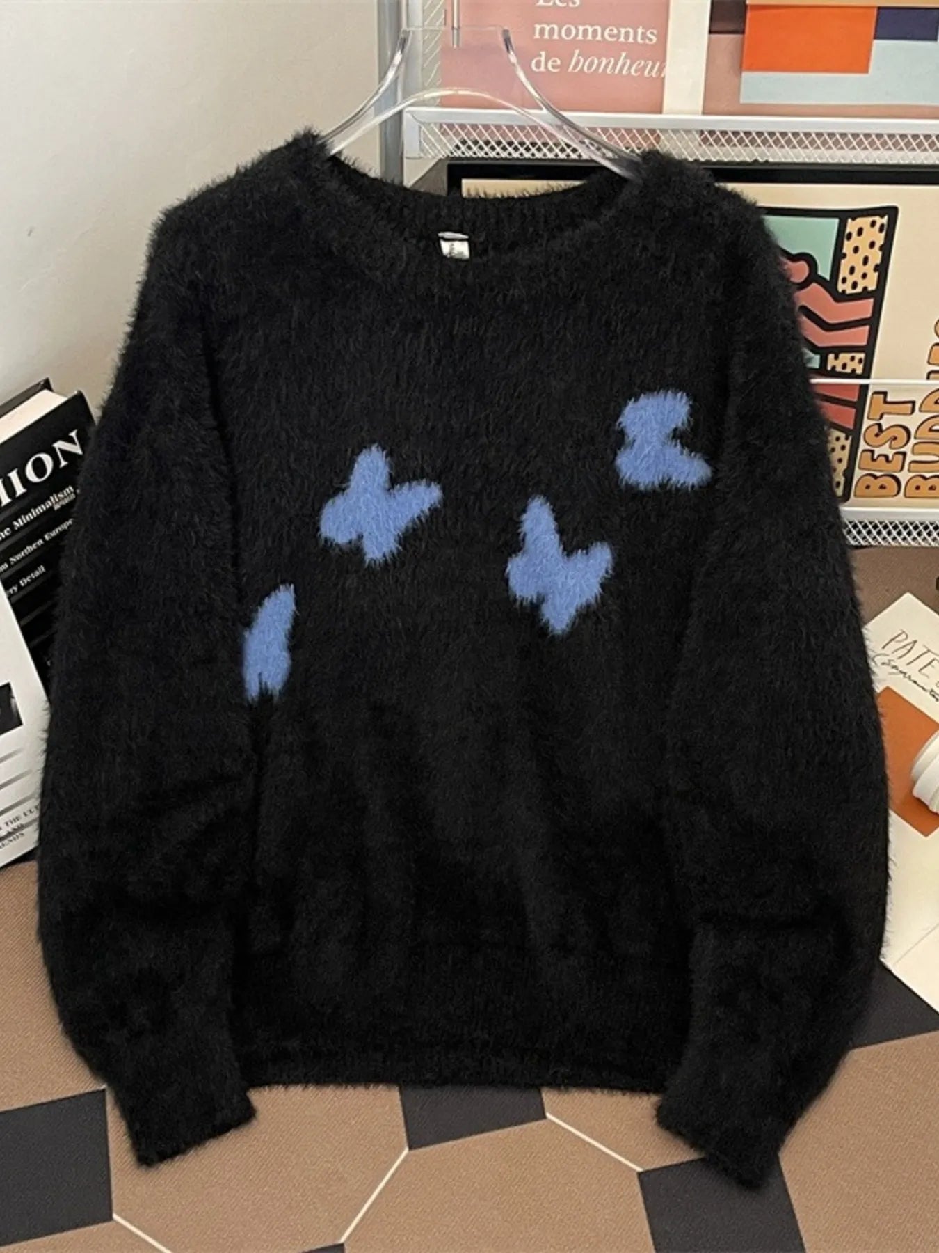 Men's plus size black fluffy butterfly round neck sweater from Trendsi, cozy knit with a relaxed fit and ribbed collar.