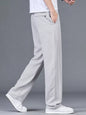 Men's plus size lightweight casual pants in black from Trendsi, featuring a relaxed fit and comfortable fabric.