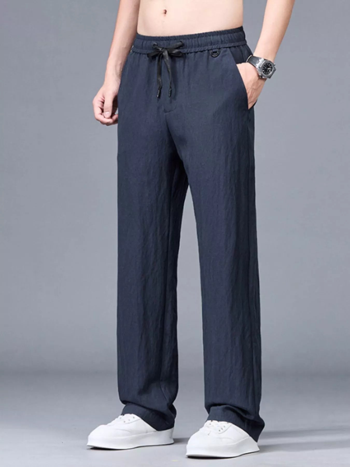Men's plus size lightweight casual pants by Trendsi in black, featuring a relaxed fit and comfortable design for everyday wear.