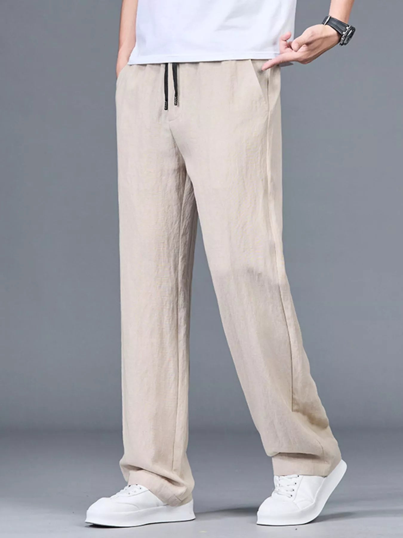 Men's plus size lightweight casual pants in black from Trendsi, featuring a relaxed fit and comfortable fabric.
