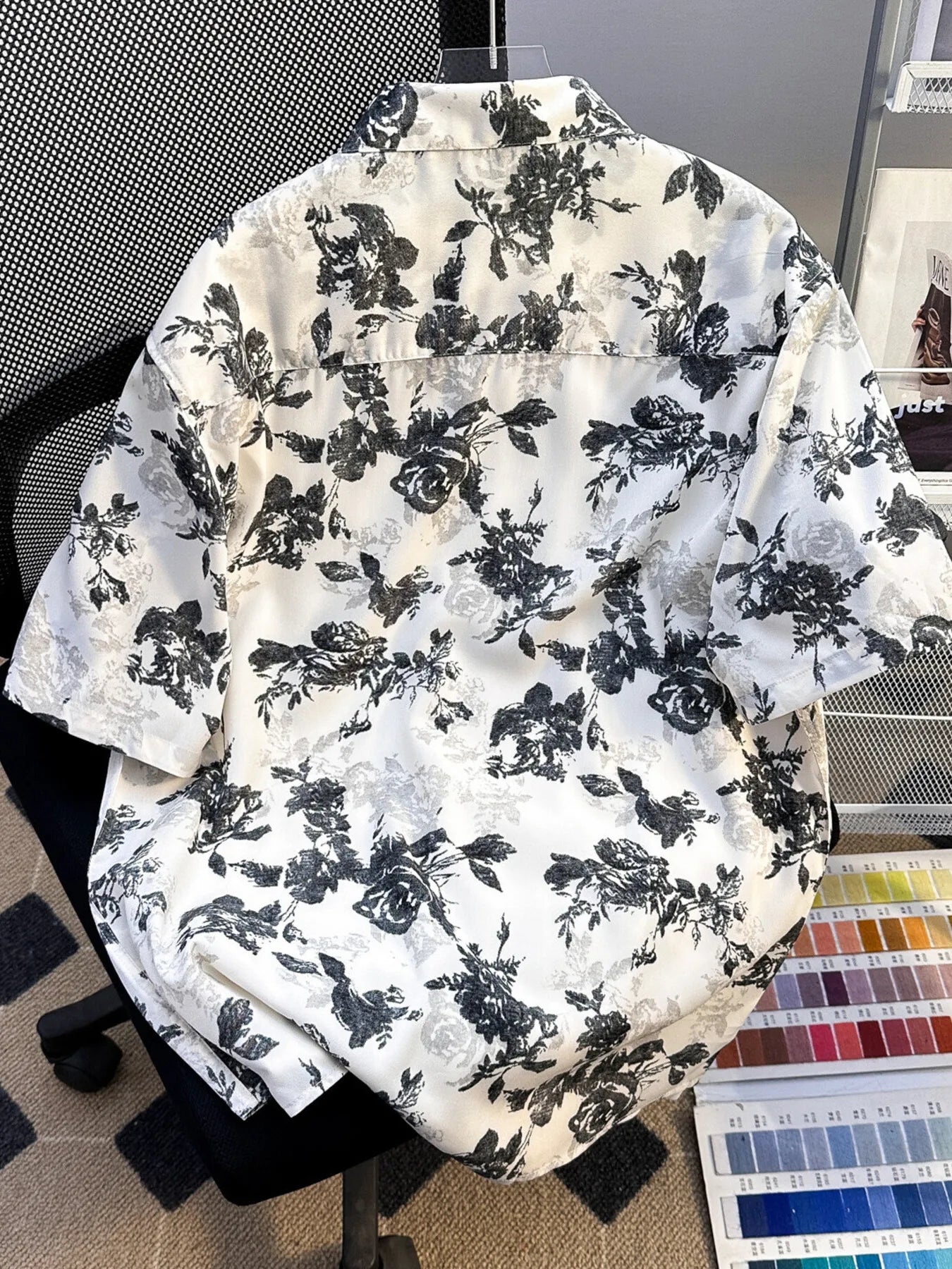 Men's plus size printed short sleeve button-up shirt in black by Trendsi, featuring a stylish pattern and comfortable fit.