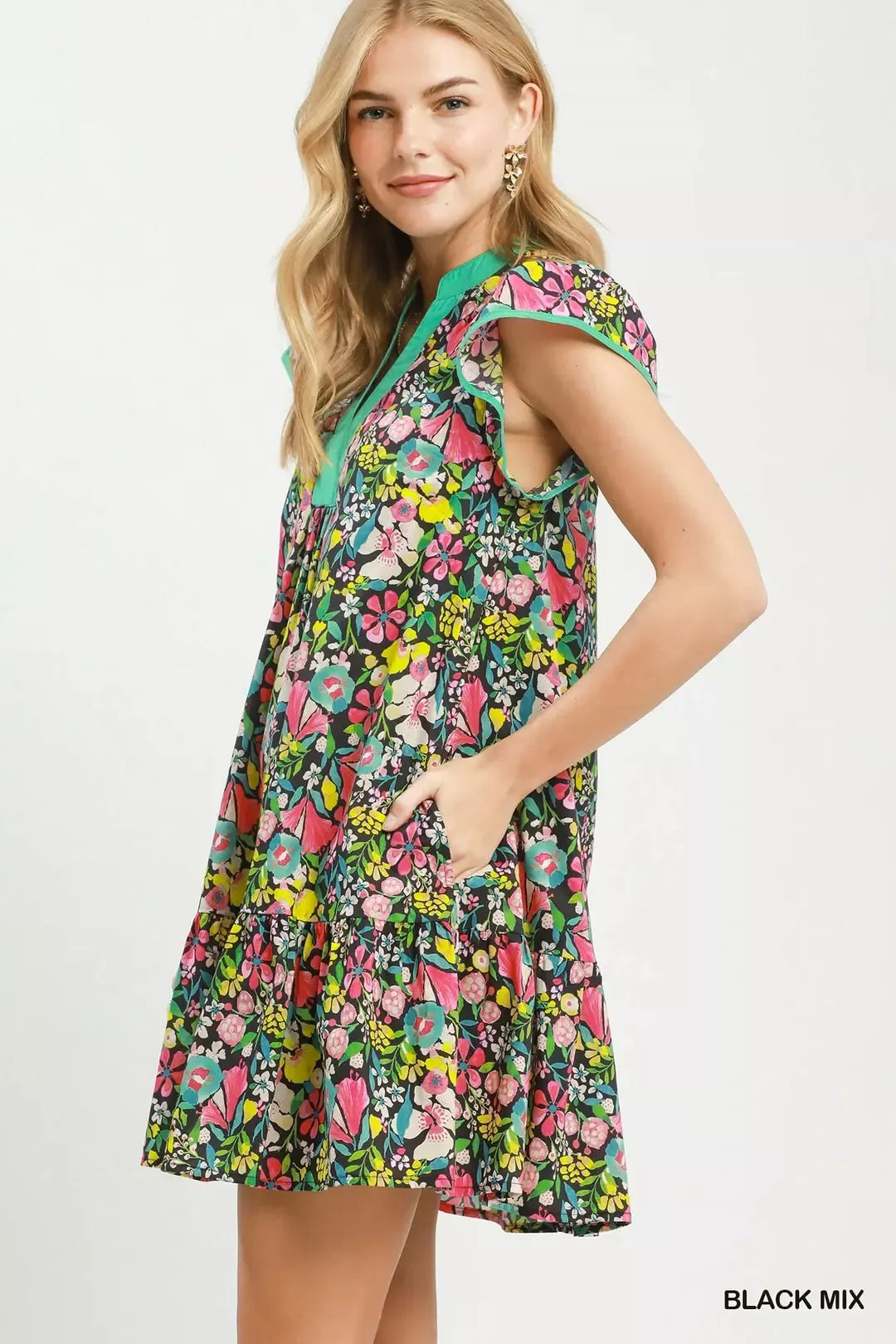 Black floral Umgee tiered mini dress with flutter sleeves, stylish and feminine for casual or dressy occasions.