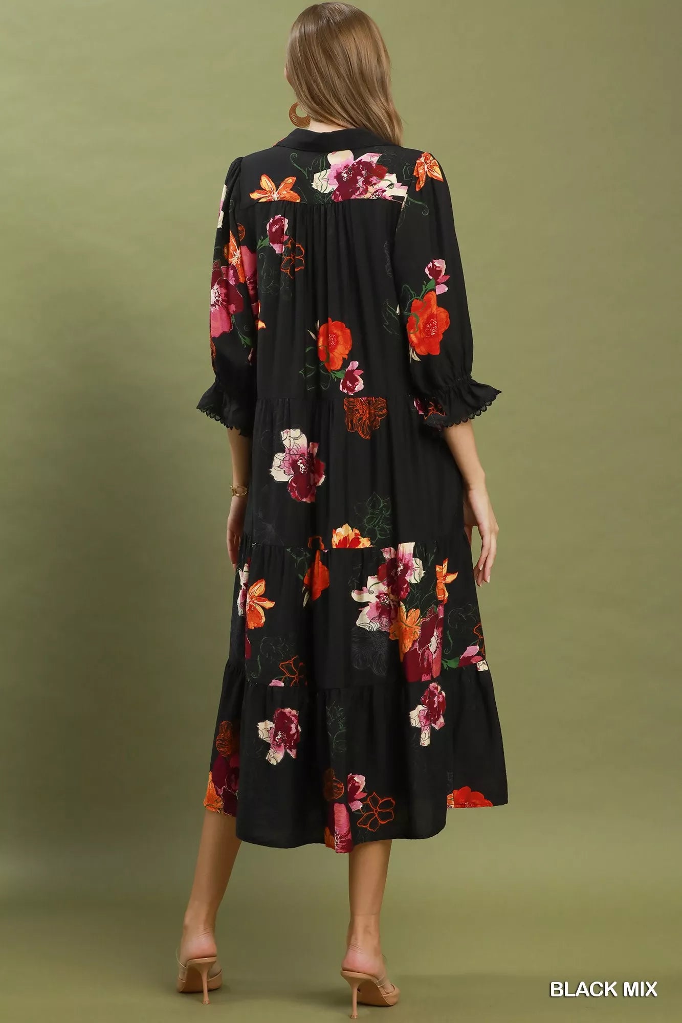 Black floral print tiered midi dress with puff sleeves from Umgee, featuring a feminine and flowing design.