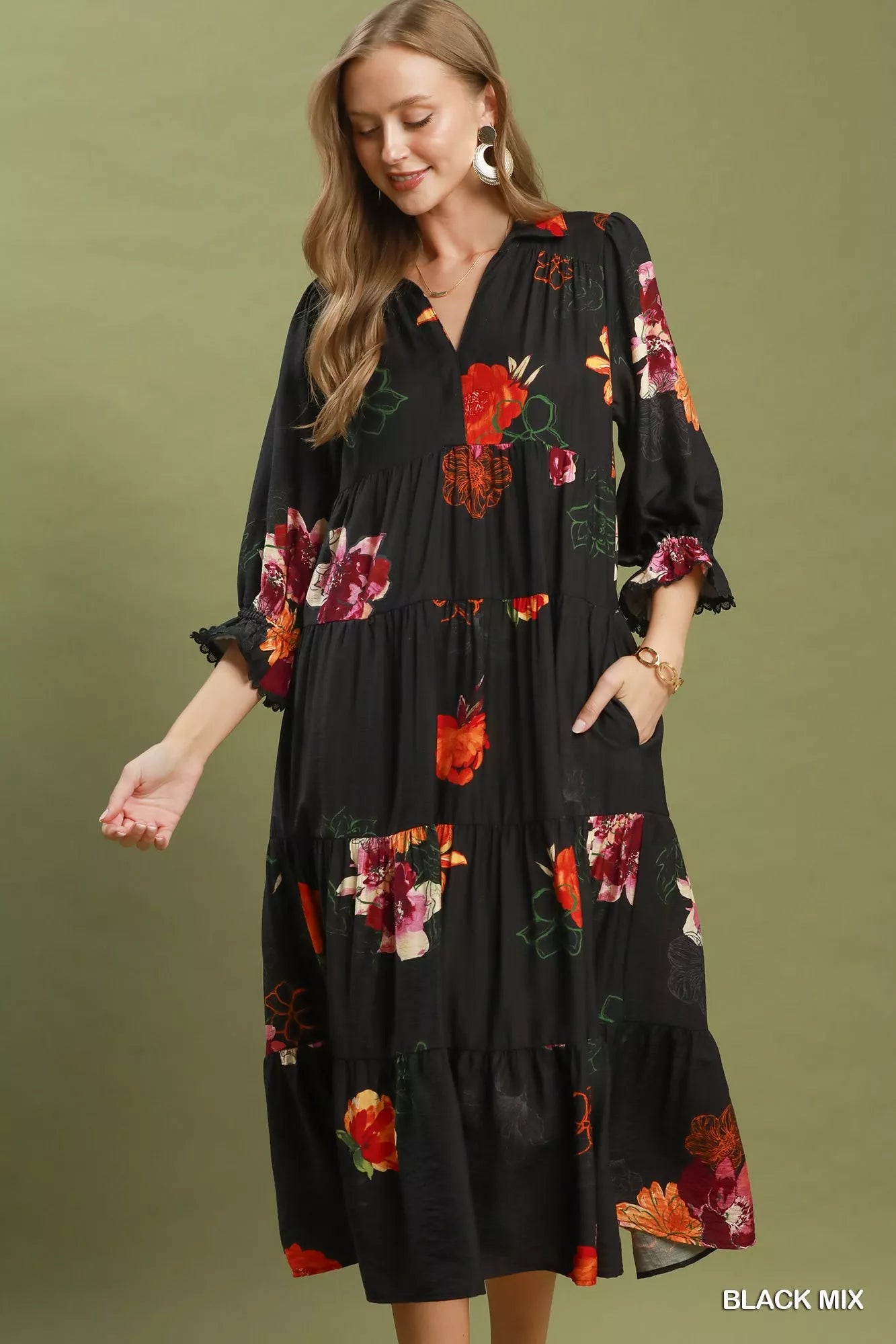 Black floral print tiered midi dress with puff sleeves from Umgee, styled with a flowy silhouette and feminine design.