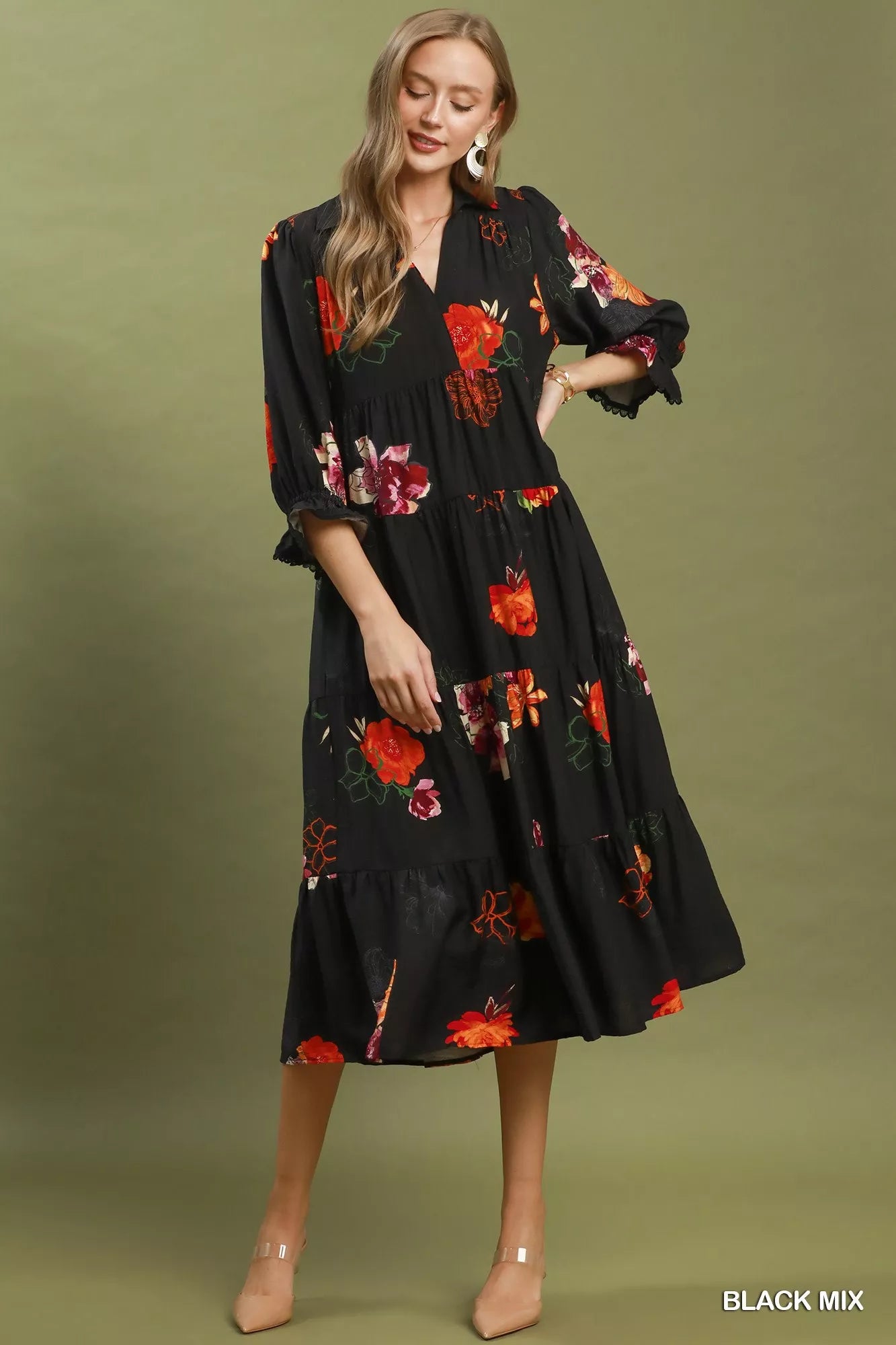 Black floral print tiered midi dress with puff sleeves by Umgee, featuring a feminine, flowy silhouette and detailed floral pattern.