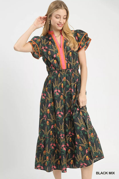 Black Umgee floral midi dress with mixed print, featuring a flowy silhouette and short sleeves, perfect for casual or semi-formal wear.