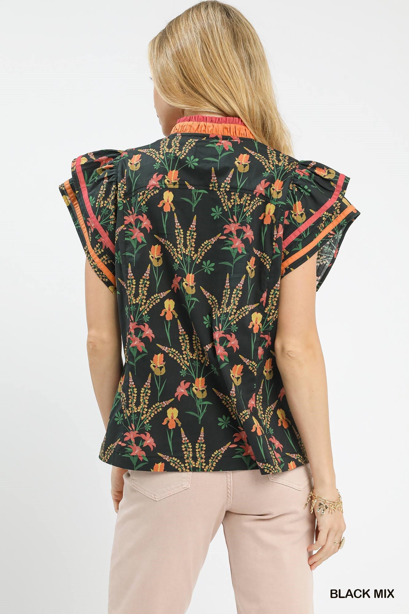Black Umgee floral print blouse with contrast trim, featuring a relaxed fit and stylish design, ideal for casual or dressy occasions.