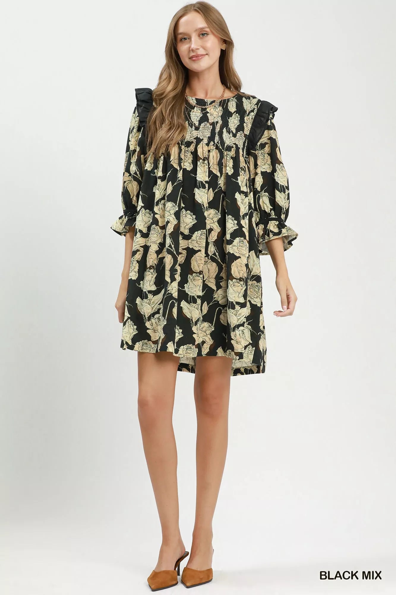 Black floral print flowy dress by Umgee with smocked bodice and ruffle details, featuring a relaxed, breezy silhouette.
