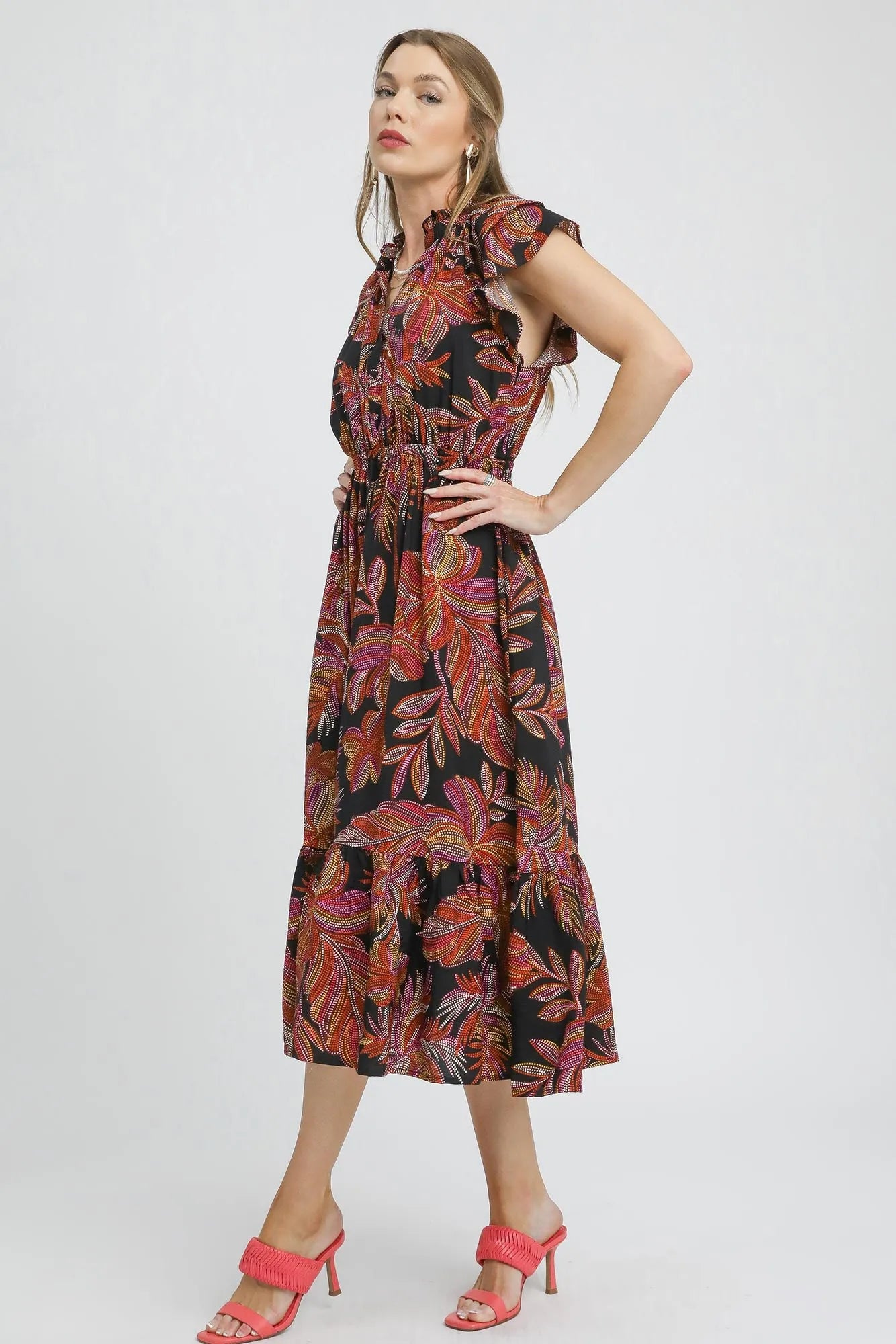 Black Umgee mix ruffle sleeve tropical midi dress with a flowy silhouette and vibrant tropical print, perfect for warm weather.