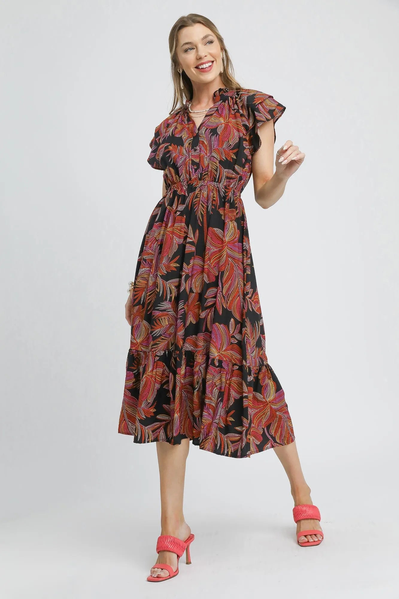 Black Umgee tropical midi dress with ruffle sleeves, featuring a mixed print design, perfect for warm-weather wear.